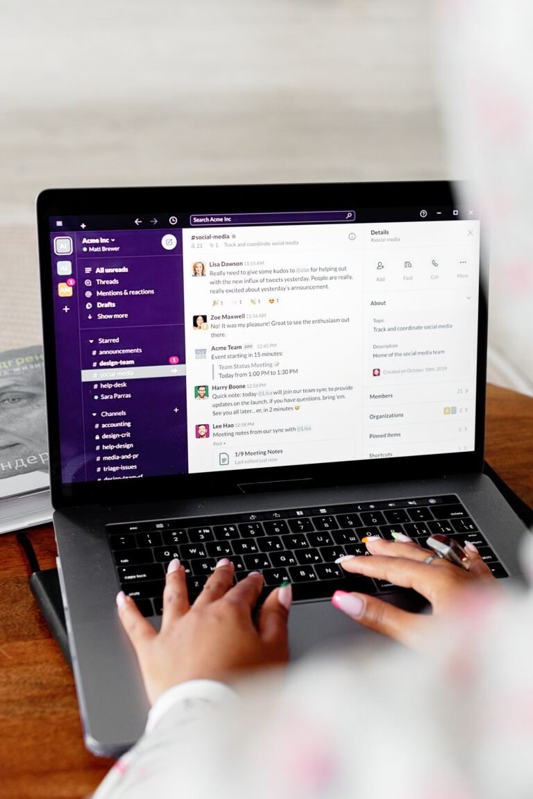 Person using laptop with Slack social media channel - Facebook ad copywriting context Content-Disposition: form-data; name="caption" Person using laptop with Slack social media channel - Facebook ad copywriting context